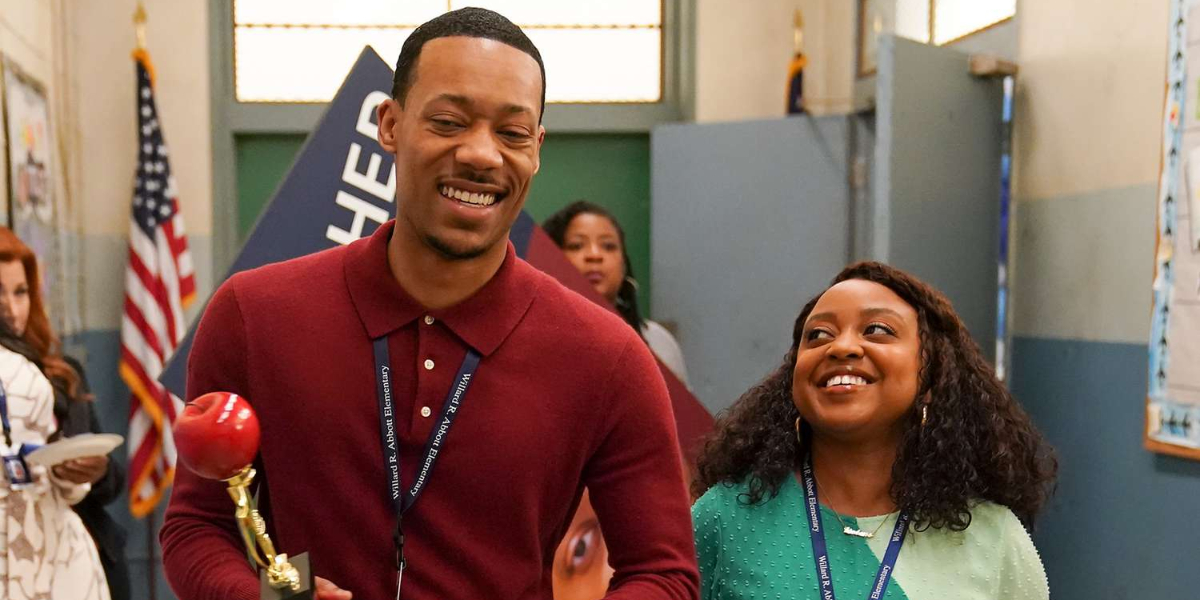 Janine Teagues and Gregory Eddie from "Abbott Elementary" walk down the hall with smiles together. | Agents of Fandom