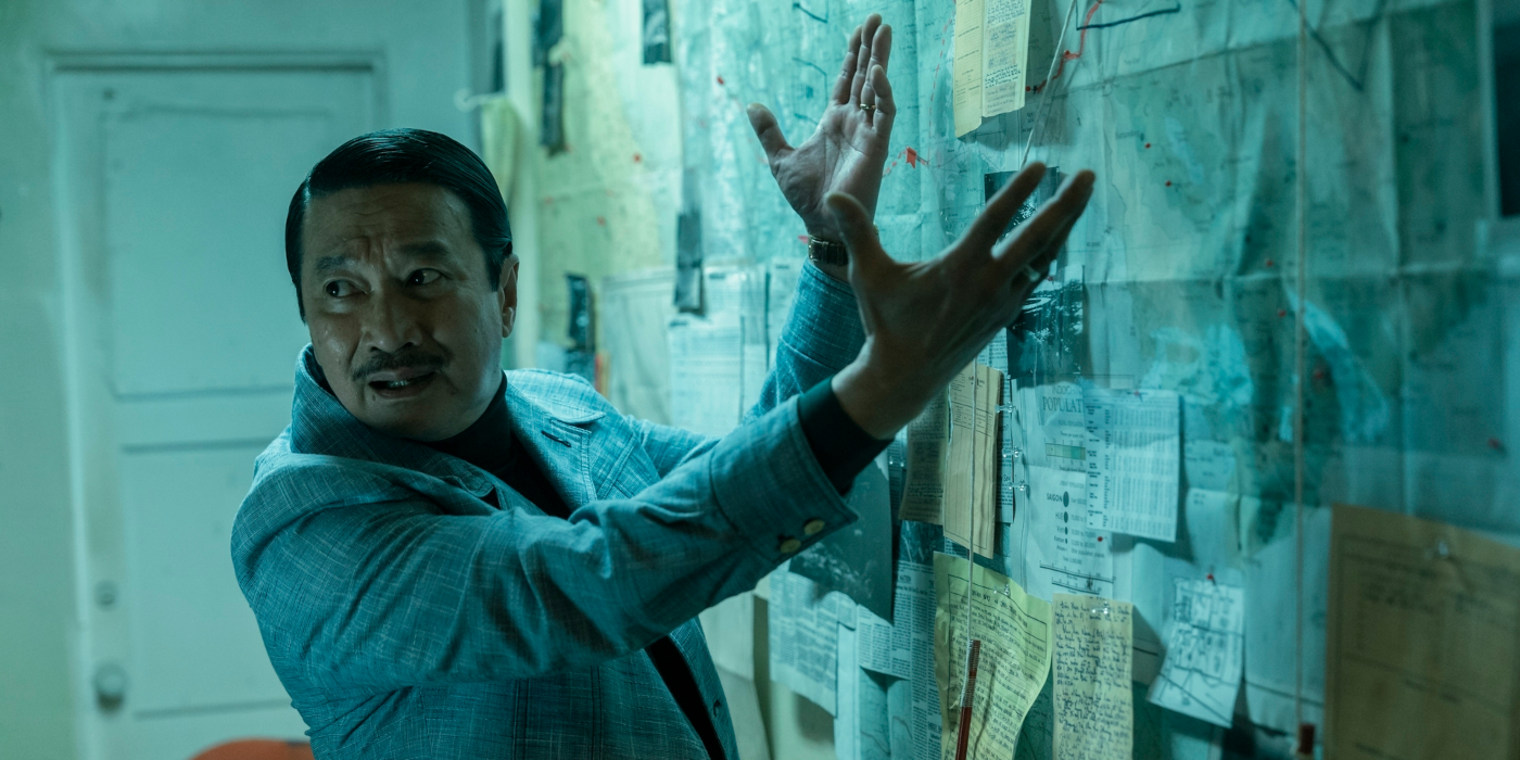The General with his hands out toward a wall of maps and information in the Sympathizer | Agents of Fanodm