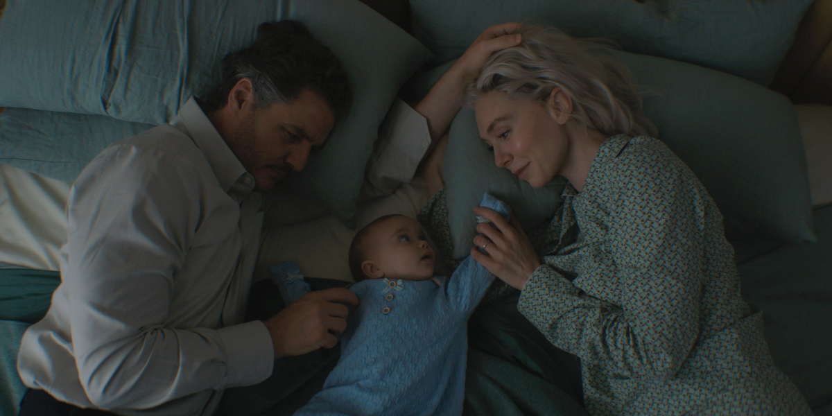 Reed Richards, Franklin Richards, and Sue Storm in bed in The Fantastic Four: First Steps | Agents of Fandom